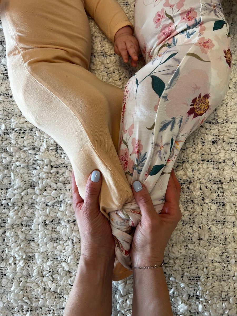 Two Babies Sleeping in MA-MA NYC Bamboo Knotted Onesies