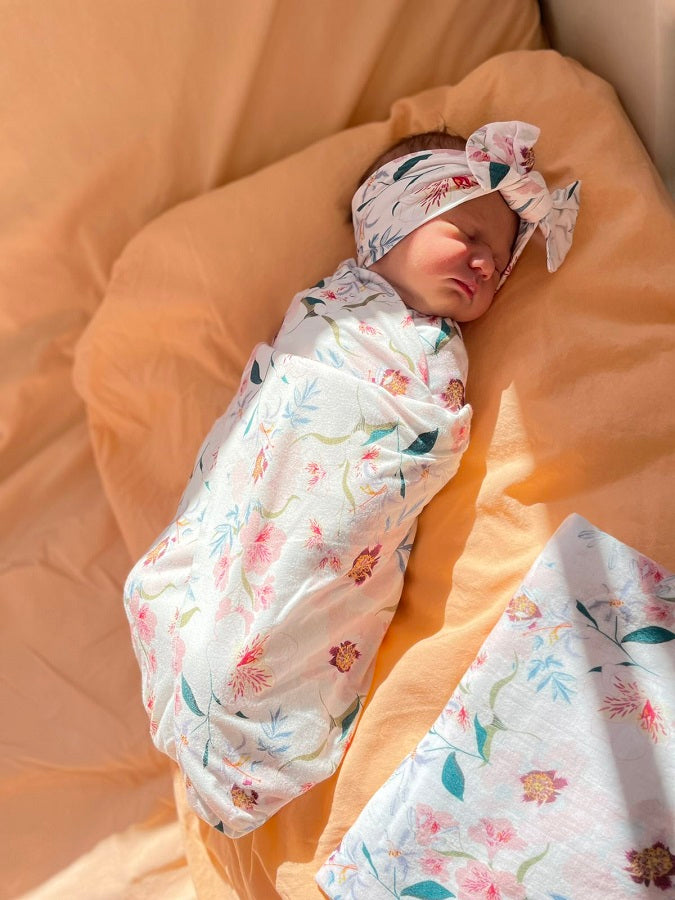 Newborn swaddled in breathable bamboo blanket from MA‑MA NYC
